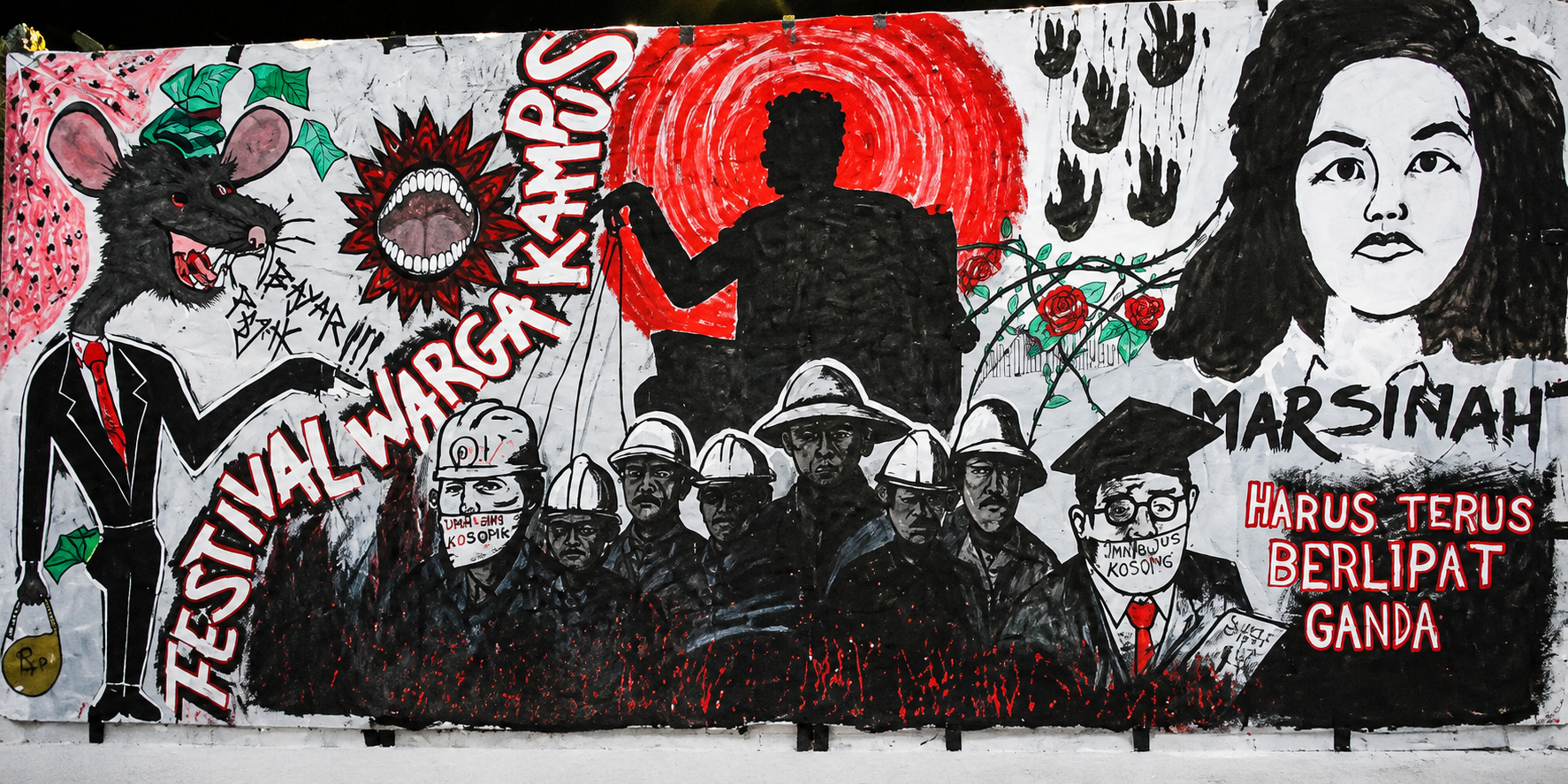Mural bertema Hari Buruh Internasional 2025 menampilkan ilustrasi Marsinah, pekerja, dan pesan tentang perlawanan terhadap ketidakadilan sebagai simbol perjuangan hak-hak buruh.